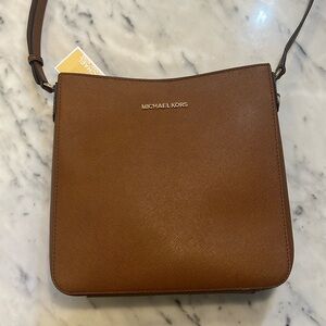 Michael Kors Jet Set Travel Purse. LG Messenger. Brown Leather. Brand New.